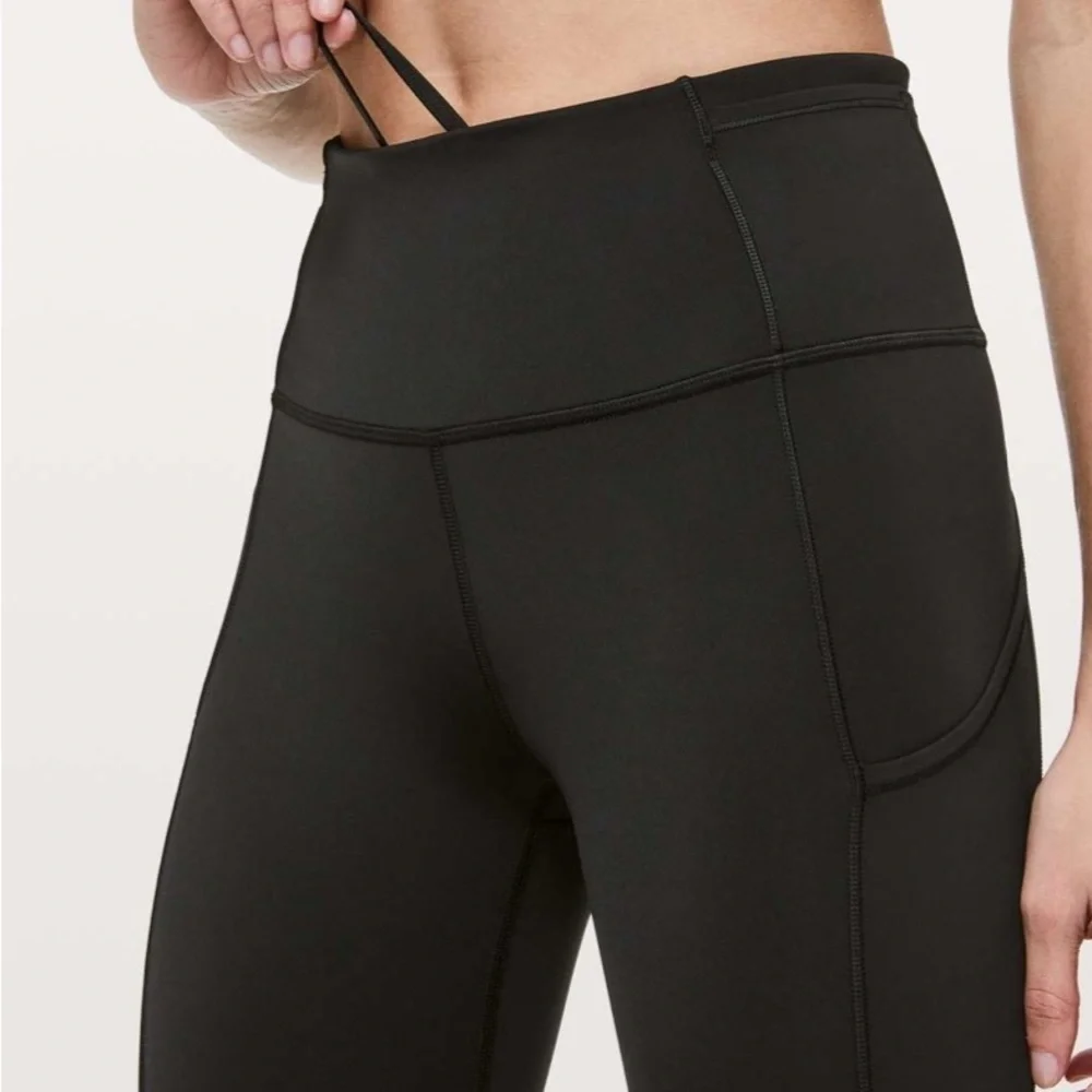Lululemon 4 Fast Free Crop Nulux 19” black crops great pre owned reflector strip